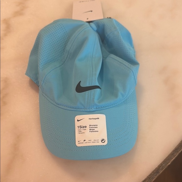 Nike Light Blue Cap with Black Swoosh - Picture 1 of 5